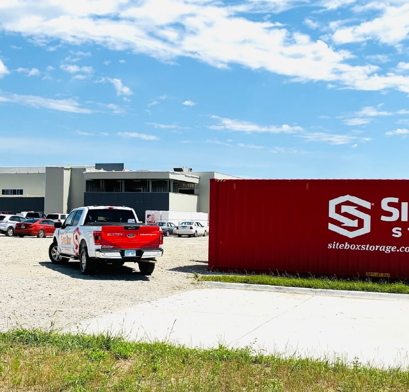 SiteBox Storage container delivered to a commercial construction site to support secure construction site storage.