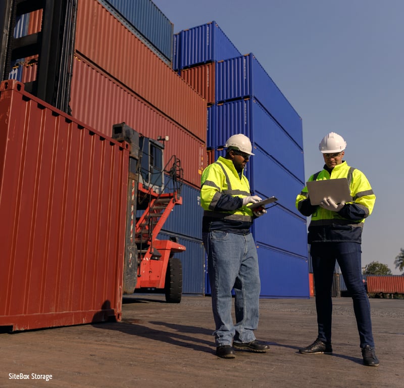 shipping containers being shipped for job site use.
